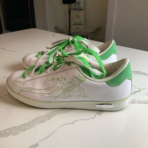 Y2K 2000s flair to your wardrobe with these vintage Baby Phat tennis shoes!